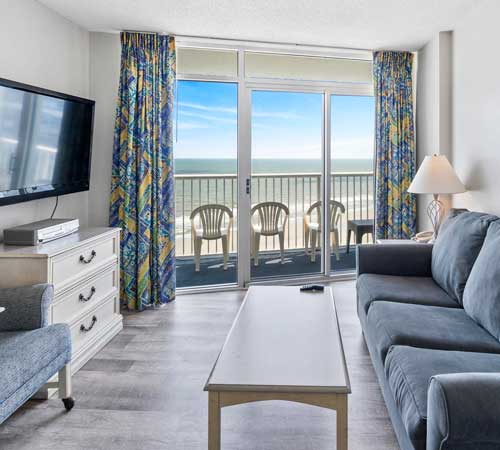 Example living room of a 1 bedroom condo at Sea Watch Resort